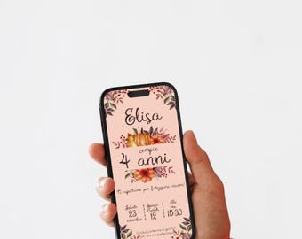 May include: A mobile phone screen displaying a birthday invitation for Elisa's 4th birthday. The invitation features a pink background with fall-themed floral and pumpkin illustrations. The text reads "Elisa compie 4 anni" and includes the date and time of the party: "Sabato 23 Ottobre alle ore 12:15:30".