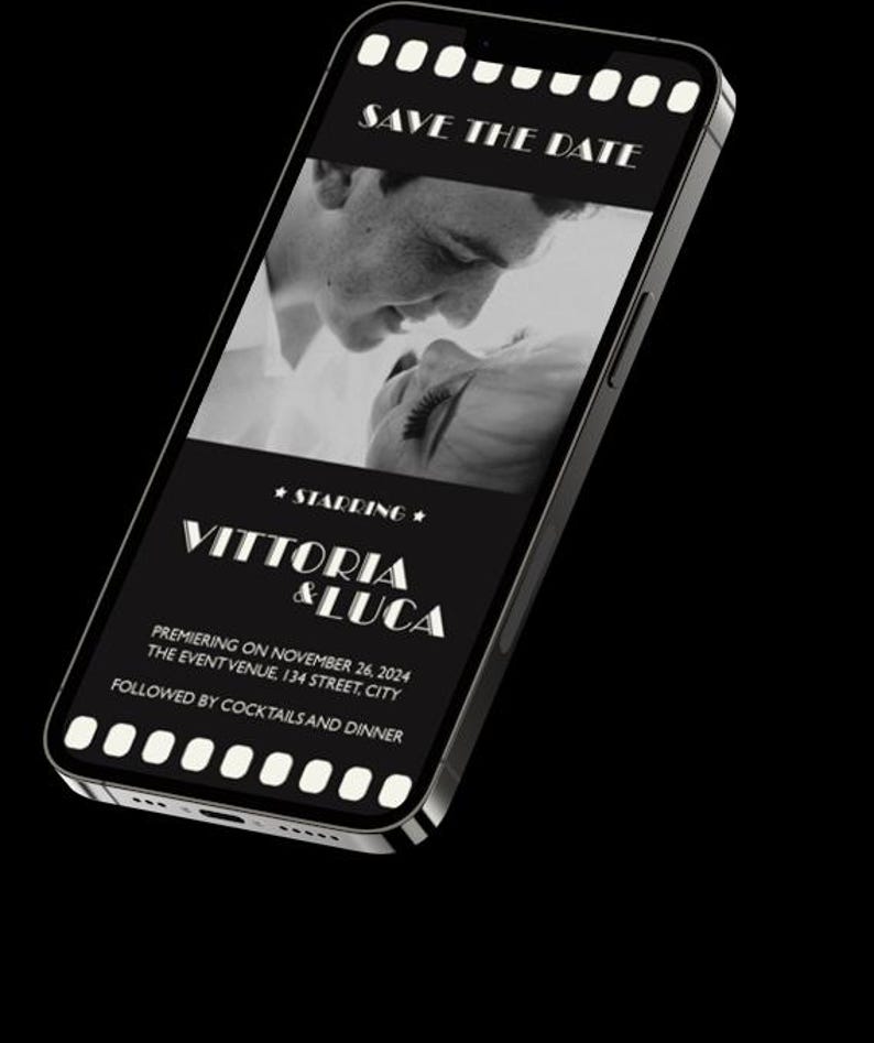 May include: A black and white photo of a couple on a smartphone screen with the text "SAVE THE DATE" at the top and "★STARRING★ VITTORIA & LUCA" in the middle. The text below reads "PREMIERING ON NOVEMBER 26, 2024 THE EVENT VENUE, 134 STREET, CITY FOLLOWED BY COCKTAILS AND DINNER".