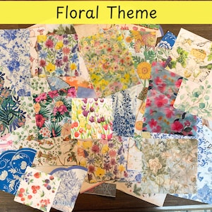 May include: A collection of paper sheets with various floral designs. The sheets feature a variety of flowers, including roses, tulips, and sunflowers, in a range of colors. The text "Floral Theme" is displayed in a yellow banner at the top.