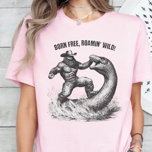 Cowboy Bigfoot Sasquatch T-Shirt, Western Loch Ness Monster Graphic Tee, Vintage Bigfoot Funny Mythical Creature Shirt, Bigfoot Nessie Tees