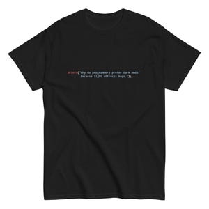 printf(”Why do programmers prefer dark mode? Because light attracts bugs..”); - Unisex tee