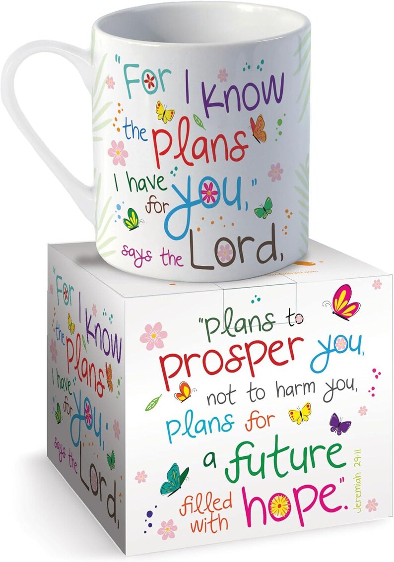 May include: A white ceramic mug and matching square box featuring colorful butterflies, small flowers, and the text: For I know the plans I have for you, says the Lord, plans to prosper you, not to harm you, plans for a future filled with hope.