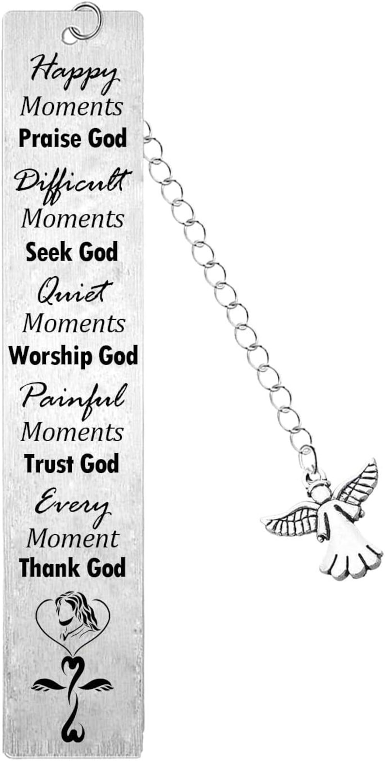 May include: A rectangular silver-toned metal bookmark featuring a chain with an angel charm. The text reads: Happy Moments Praise God, Difficult Moments Seek God, Quiet Moments Worship God, Painful Moments Trust God, Every Moment Thank God.