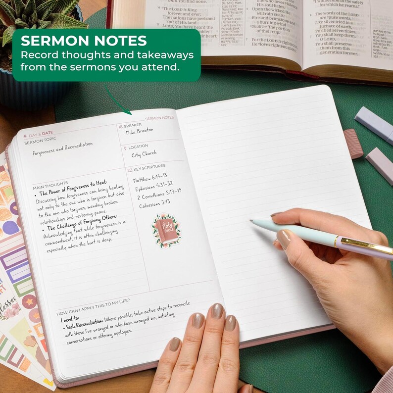 May include: An open sermon notes journal with lined pages, featuring printed sections for date, speaker, location, sermon topic, main thoughts, key scriptures, and application. A light blue pen rests on the page, which includes a small Bible sticker.