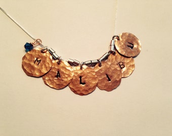 Malibu necklace Copper hammered stamped with a blue crystal to symbolize the ocean