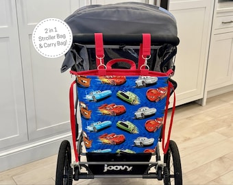 ¡Cochecito y bolsa de transporte 2 en 1 de Disney Pixar Cars! Organizador desmontable para cochecito, ideal para viajes y días en los parques de Disney.