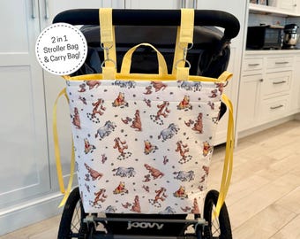¡Cochecito y bolsa de transporte 2 en 1 de Winnie the Pooh! Organizador desmontable para cochecito, ideal para viajes y días en los parques de Disney.