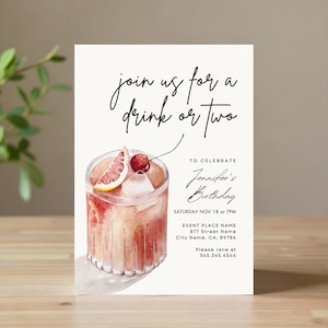 May include: A cream-colored invitation card featuring a watercolor cocktail illustration with a cherry and grapefruit garnish. The card's text says "join us for a drink or two" and "Jennifer's Birthday", plus event details.