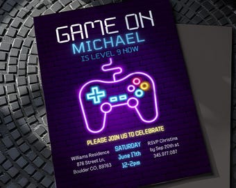 May include: A purple invitation with neon-style text and a game controller graphic. The text reads "GAME ON MICHAEL IS LEVEL 9 NOW" and includes event details: date, time, location, and RSVP information.