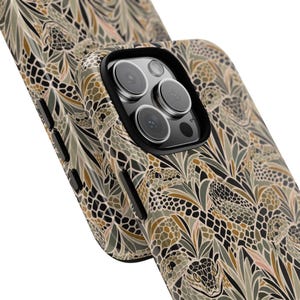 May include: A smartphone case featuring a repeating pattern of snakes intertwined with stylised leaves in shades of olive green, tan, black, and cream. The case has a black camera cutout frame and black side buttons, showing a triple lens camera.