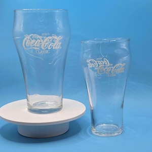 Set of two different sizes Vintage Coca-Cola Classic Bell Shaped Glass - Iconic Collectible Drinkware, Perfect for Display or Use