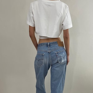 Vintage Levis 501 button fly soft faded tall boyfriend baggy 80s Levis jeans made in USA size 33 x 33