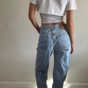 vintage Levi&#39;s 512 faded light wash womens Levis jeans USA size 29