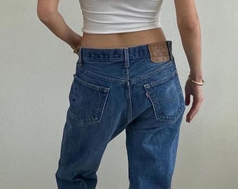 Jeans Levi's 501 estilo boyfriend alto con cierre de botones, estilo vintage de los años 80, que se encogen al estirarse, fabricados en EE. UU., talla 31x33.