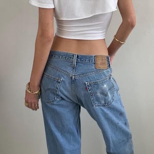 Vintage Levis 501 button-fly verf splotched jeans: VS 31 x 29