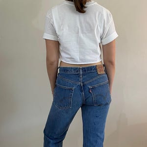 Jeans Levis vintage anni &#39;80 modello 501 originali, lavaggio medio sbiadito, con patta e bottoni, modello boyfriend, taglia 31 x 32