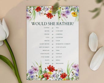 May include: A white card with the text "WOULD SHE RATHER?" and various choices like "Coffee or Tea" and "Movie or Concert." The card is decorated with a floral border of red, purple, and yellow flowers.
