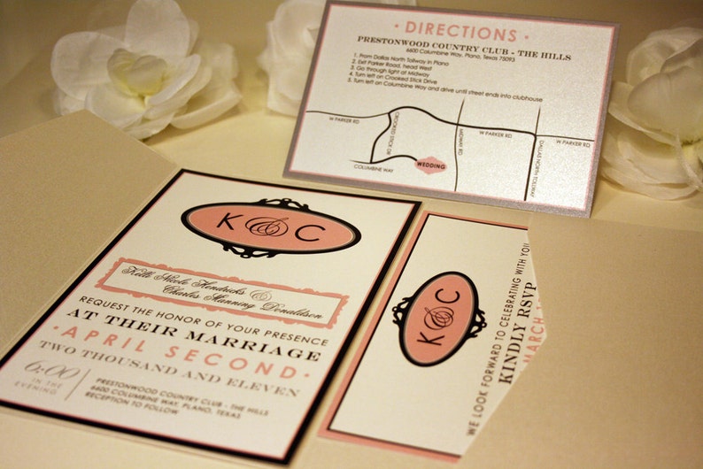 May include: A wedding invitation with a pink and black design. The invitation features the couple's initials "KOC" in a decorative oval. The invitation is for 2nd April 2011 at Prestonwood Country Club - The Hills.