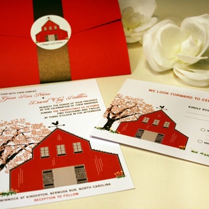 May include: A red barn wedding invitation with a white background and a cherry blossom tree. The invitation includes the names Geisa Reis Nares and David Clay Rollins, the date Sunday, October 21, 2012, and the time 3:00 PM. The invitation also includes the location Winmock at Kinderton, Bermuda Run, North Carolina. The invitation includes a RSVP card with the text "We look forward to celebrating with you!" and a request to RSVP by September 3rd.