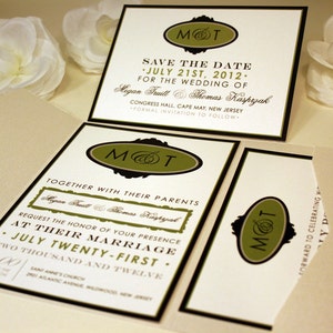 May include: Save the date wedding announcement with black and green lettering. The announcement includes the couple's names, Megan Fruitt and Thomas Kasprzak, the date 21st July 2012, and the location, Congress Hall, Cape May, New Jersey.
