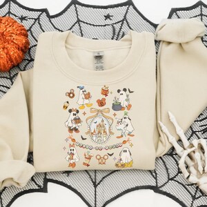 ディズニー ハロウィン コケット スウェットシャツ、不気味なミッキーと仲間たちのスウェットシャツ、ディズニーランド ハロウィン パーカー、ディズニー パンプキン スウェット、トリック・オア・トリート