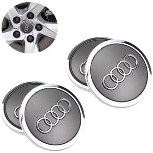 Könnte beinhalten: Vier silberne und graue Radkappen mit dem Audi-Logo in der Mitte.