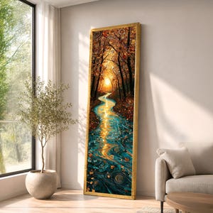 May include: A tall, rectangular framed wall art piece featuring a vibrant forest scene with a winding turquoise river reflecting a bright golden sunset. The trees have dark silhouettes and orange foliage, with swirling patterns in the water.