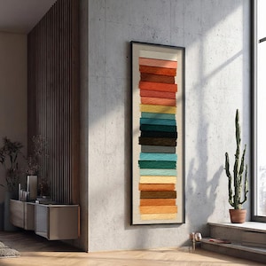 Può includere: Un set di tre tazze in ceramica con finitura opaca e macchiettata. Le tazze sono nei toni del crema, grigio chiaro e grigio scuro. Ogni tazza ha un design semplice e minimalista.