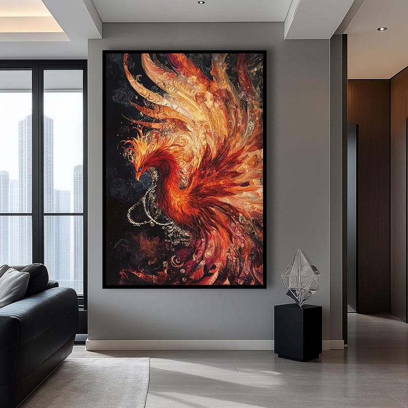 May include: Large framed artwork featuring a vibrant phoenix. The artwork showcases a fiery bird with red, orange, and yellow hues against a dark background. The phoenix has detailed feathers and a decorative chain.