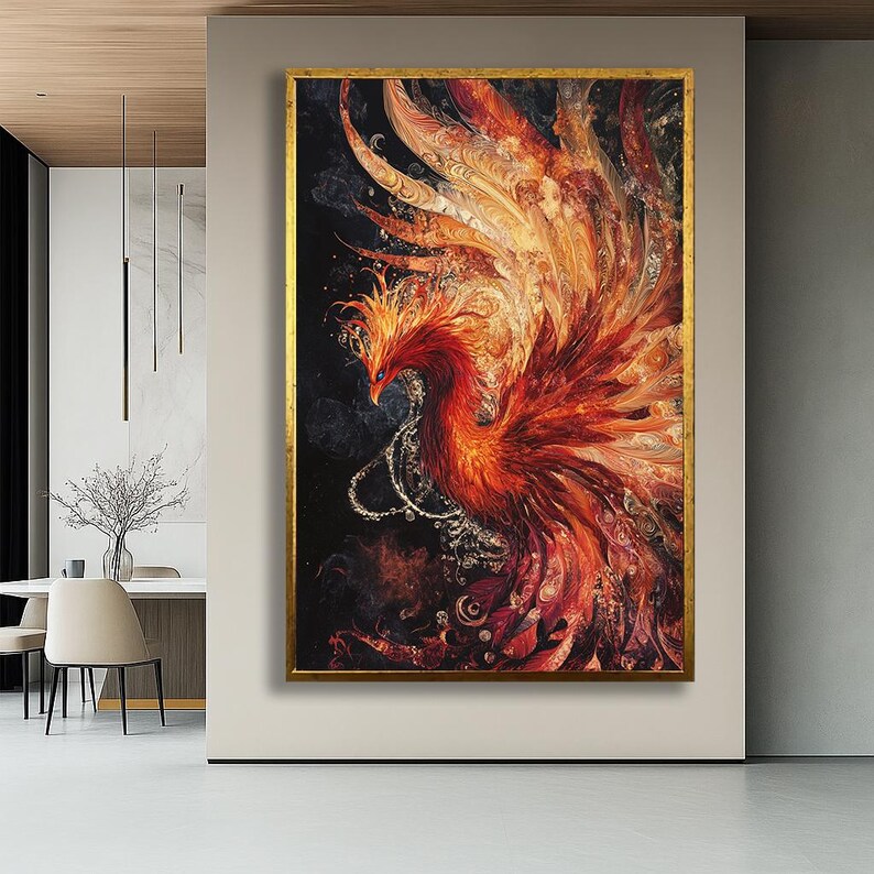 May include: A framed artwork depicts a phoenix in vibrant shades of red, orange, and gold against a dark background. The bird's feathers are detailed, and the artwork is enclosed in a gold frame, creating a striking visual for home decor.