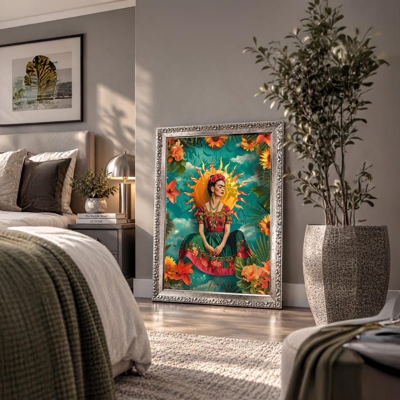 May include: A framed rectangular wall art print featuring a central figure with dark hair and a floral crown, wearing a red and green dress. The figure is surrounded by a bright yellow sun, orange flowers, and green foliage against a teal background.