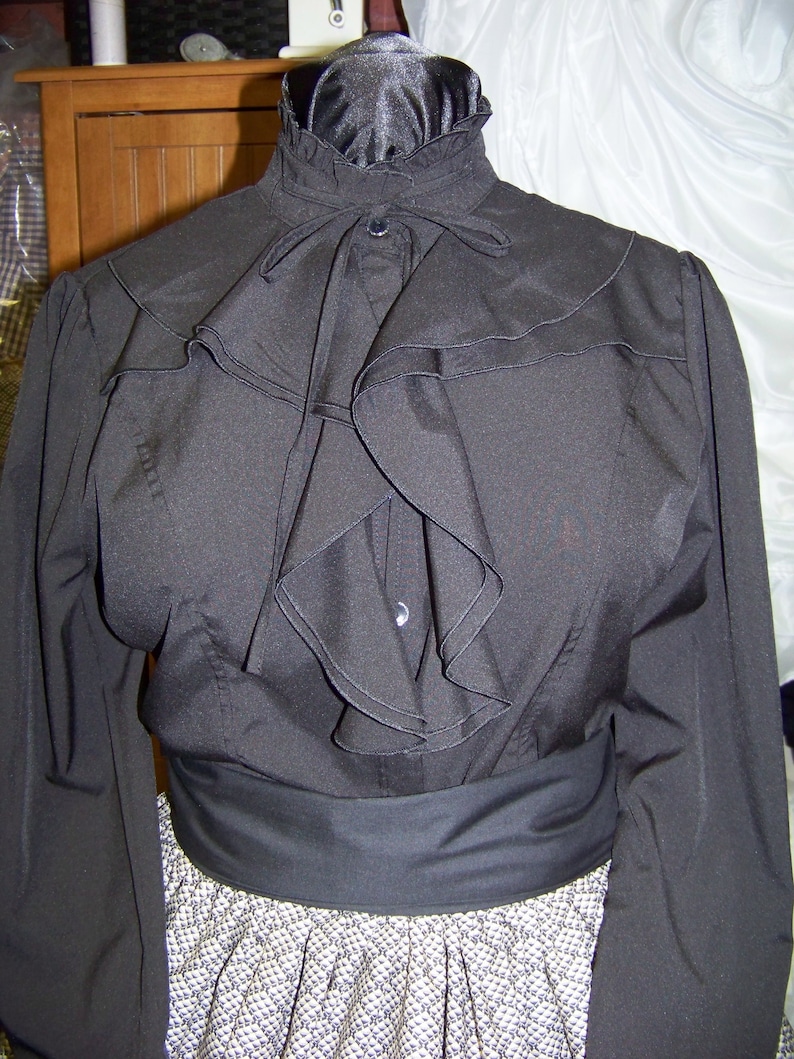Civil War style ladies blouse Black cotton blend with ruffles in the front and around the neck