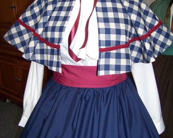 Dickens Christmas outfit long navy-blue Drawstring skirt with navy blue and beige one inch check cotton cape with burgundy trim and sash