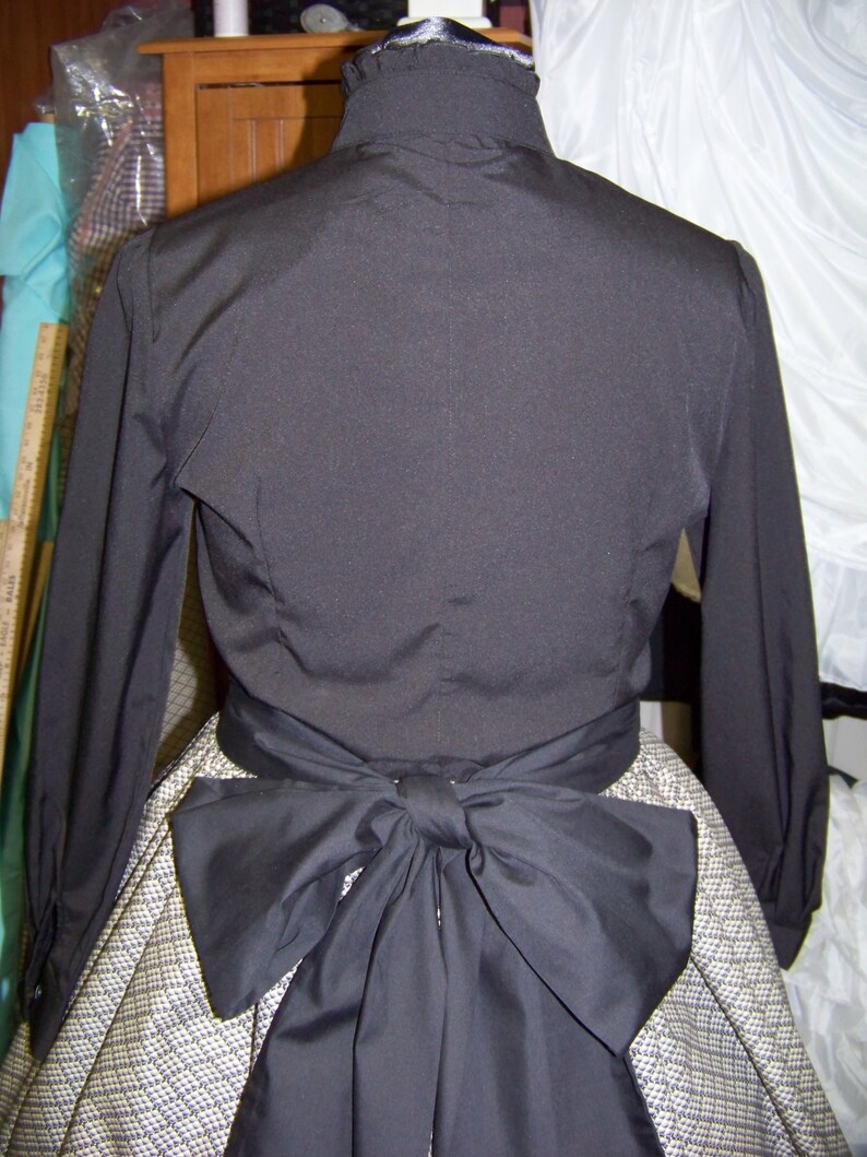 Civil War style ladies blouse Black cotton blend with ruffles in the front and around the neck