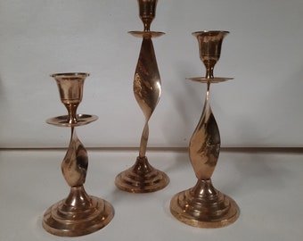 Vintage Brass Candlesticks set of 3 from the 1980's made in India, with a swirl base.