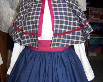 Dickens Christmas outfit long solid navy blue Drawstring skirt with navy blue, burgundy, green and tan plaid homespuncape and burgundy sash