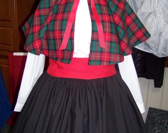 Dicken's Christmas Caroler cape Red,black and green Plaid cape reversible red solid on back one size fits most with Black Skirt and red sash