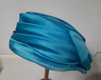 Vintage ladies teal blue satin hat with bow on back