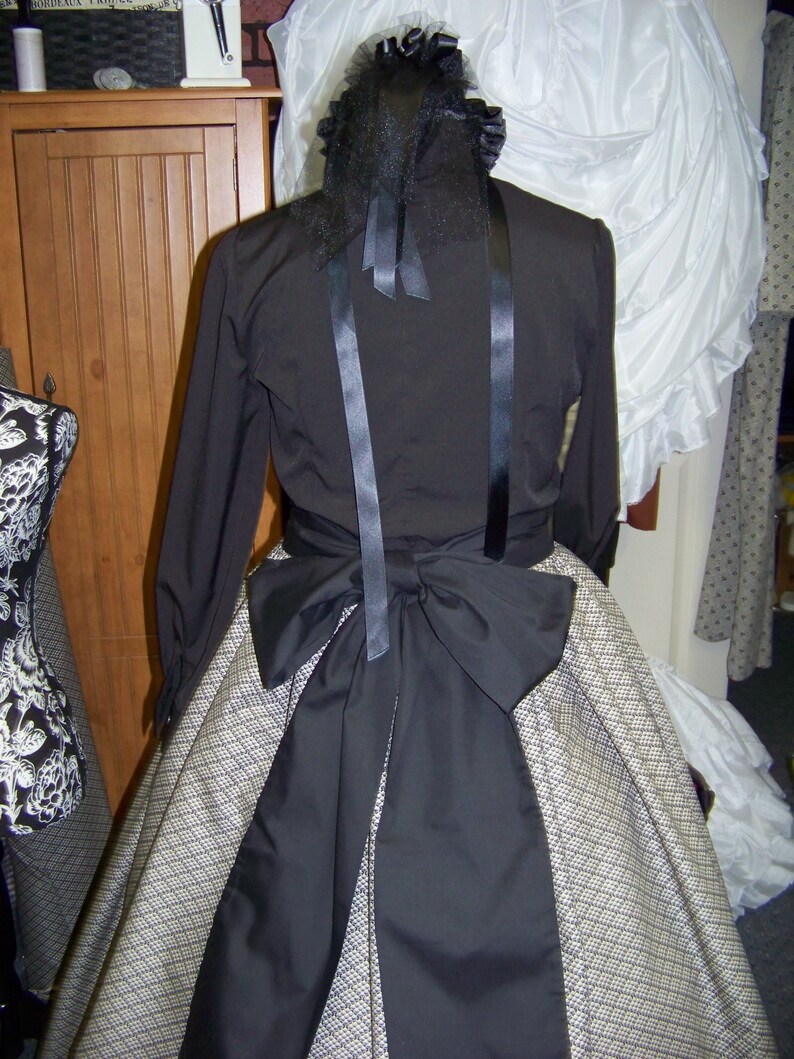 Civil War style ladies blouse Black cotton blend with ruffles in the front and around the neck