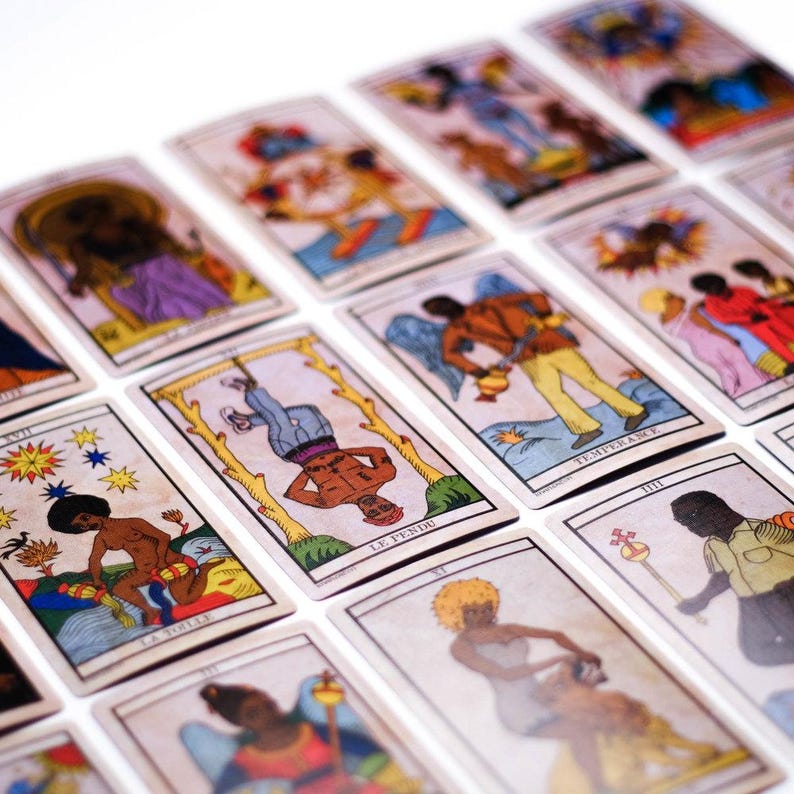May include: A set of tarot cards with illustrations of people in different poses and settings. The cards have a vintage appearance with a cream background and colourful imagery. Some cards have text in the image.