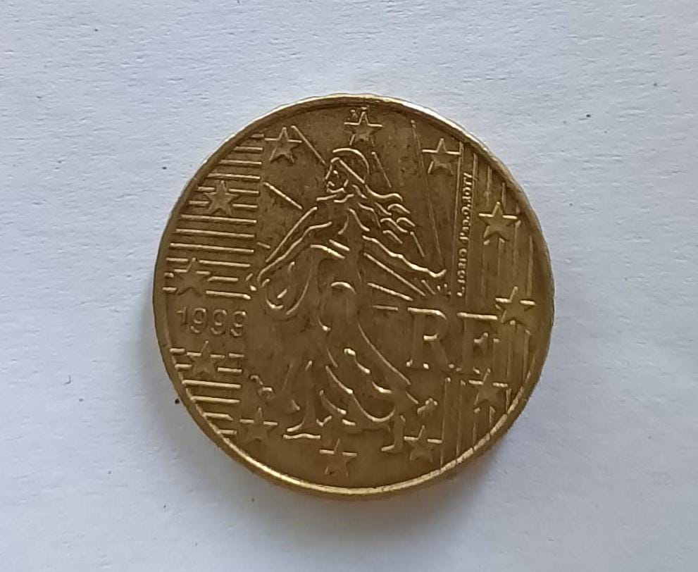 フランス10セント硬貨（西暦1999年もの）。 il_fullxfull.6270362287_ovqp.jpg