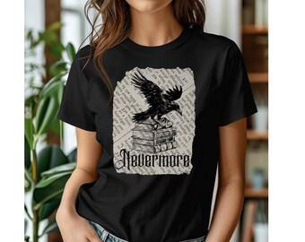 May include: Black t-shirt with a graphic print of a raven perched on a stack of books. The graphic includes the text "Nevermore".