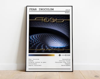 May include: A poster for the 2019 Tool album "Fear Inoculum". The poster features a black and white image of a swirling, abstract pattern with the album title in gold lettering. The album title is also repeated in a smaller font at the bottom of the poster. The poster also includes a list of the album's tracks.