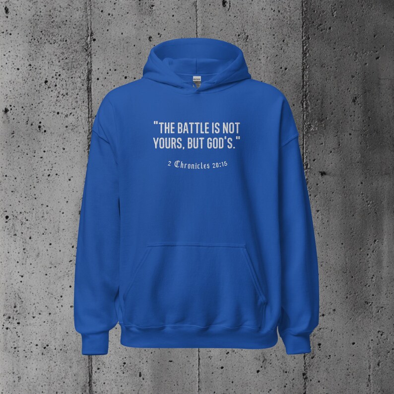 Christian hoodie with a powerful scripture quote from 2 Chronicles 20:15, designed for those seeking encouragement and motivation through their faith.