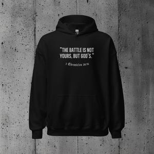 Inspirational hoodie featuring a Bible quote, designed for spiritual believers who appreciate meaningful clothing that reinforces their trust in God during tough times.