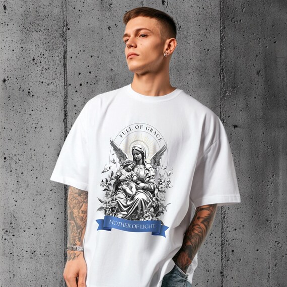 聖母マリアTシャツ：宗教的なグラフィックTシャツ - Etsy 日本