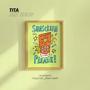 May include: A framed art print with a light green background features a cartoon sunscreen tube with the text "SUNSCREEN PLEASE!" in blue and white. The tube is orange with the letters "SPF" and sun graphics. The print is in a wooden frame.