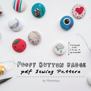 May include: A collection of 10 colorful felt button badges with various designs, including a house, a heart, a fish, a cat, an apple, a cloud, a reindeer, an eye, a bird, and a patchwork design. The buttons are 3.7 cm in diameter and are arranged on a white surface with spools of thread and sewing scissors. The text "POOFY BUTTON BADGE pdf Sewing Pattern by Momshoo" is written in black on a white background.