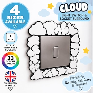 May include: A cloud-shaped light switch and socket surround featuring a white cloud design with black outlines, framing a metallic silver light switch. Text on the image includes 4 SIZES AVAILABLE, CLOUD LIGHT SWITCH & SOCKET SURROUND, FITS UK SWITCHES & SOCKETS, 33 COLOUR OPTIONS, 3D PRINTED IN THE UK, and Perfect for Nurseries, Kids Rooms & Playrooms.