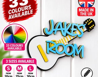 May include: A white guitar-shaped wall sign with black outlines and yellow fret details. The sign features the blue 3D text "JAKE'S ROOM". Text overlays indicate 33 colors available, 3 sizes from 20cm to 30cm, and a personalized option.